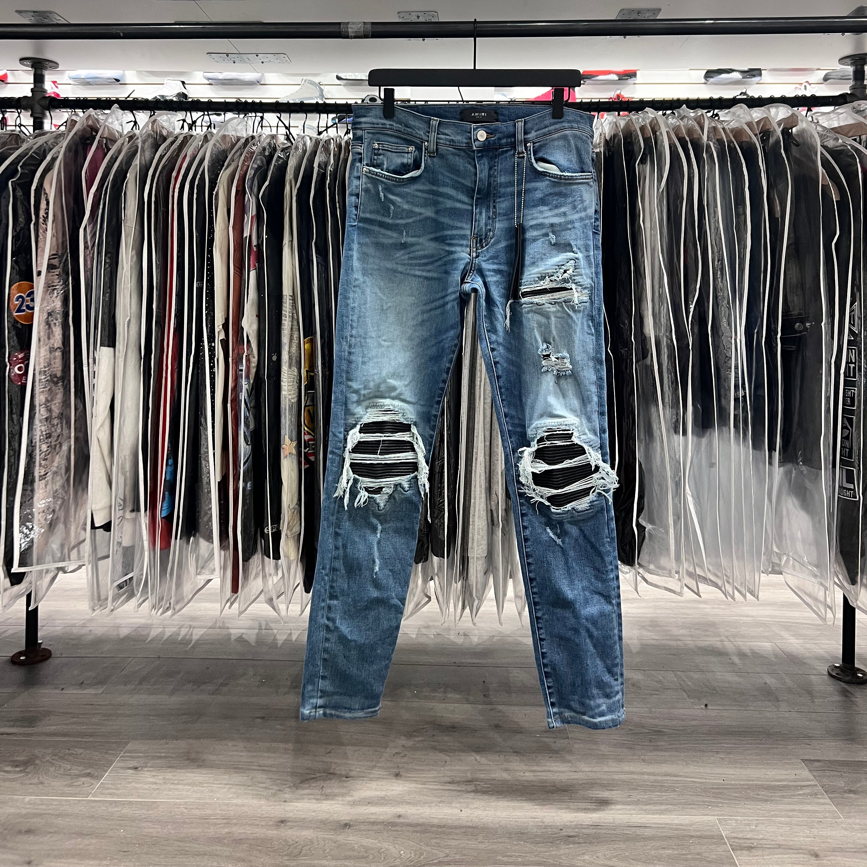 Amiri MX1 Light Wash Black Patch Jeans (Lightly Worn)